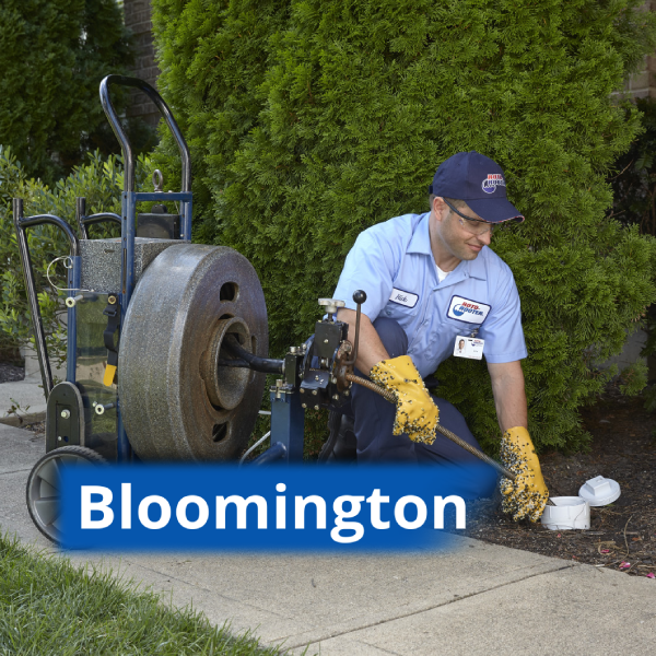 Roto-Rooter Drain Tech working in Bloomington